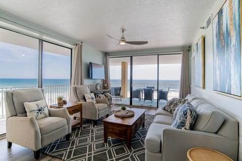 Panoramic Gulf Views Through Open Living Area to Balcony