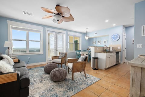 Living area - Open floor plan with dining, kitchen & living areas all connected. Ocean view from living area & master bedroom