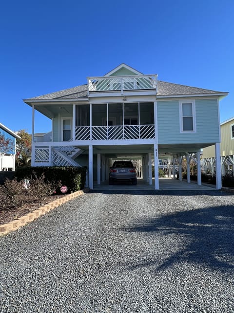 Parking for 4 vehicles (2 under Patio and 2 on rocks)