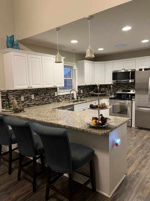Kitchen has (rice cooker, air fryer,  hot air popcorn machine, crock pot)