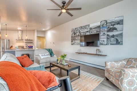 Enjoy movie nights or quiet conversations in this inviting living room.