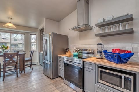 A gourmet kitchen with high-end appliances and plenty of space for meal prep.