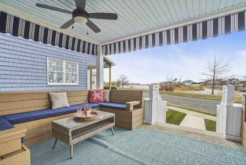 Enjoy drinks on the large porch with plentiful seating