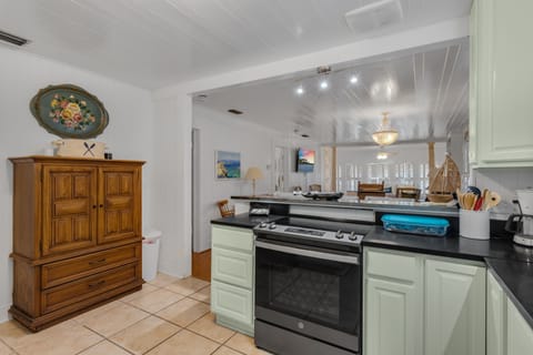 Armoire serves as alternate Pantry.  Lower drawers have tools, please watch kids