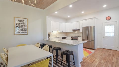 Dining table seats 6 and additional 4 can join on bar stools.