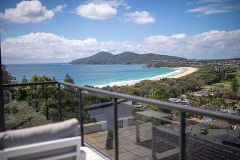 Wow! Relax with a drink and nibbles here and take in the view from the balcony.
