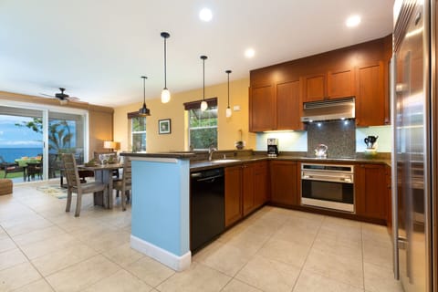 Fully equipped kitchen offers generous counter space and storage.