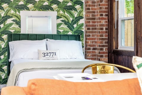 The Florida Rooms queen-sized bed