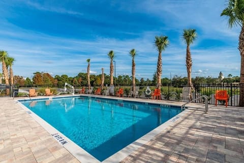 Dive into vacation vibes at the resort-style pool.