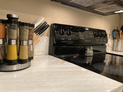 Kitchen includes basic oil / spices, blender, coffee, microwave, & toaster oven.