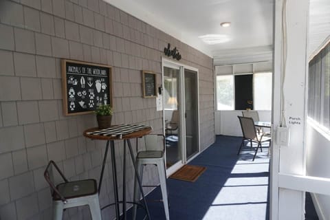 Relaxing wrap around porch with lots of seating