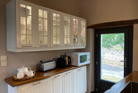 Small appliances include a toaster, Nespresso, electric kettle, microwave + more