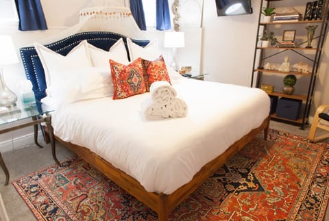 Brand new ultra plush King size bed. Pristine white cotton sheets and comforter!