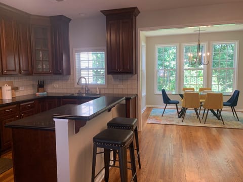 Kitchen and Dining.  Island seating for 3.