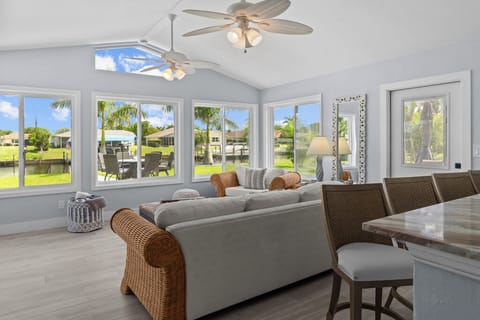 Enjoy breathtaking canal views from this bright and spacious living room — a serene escape during your stay.