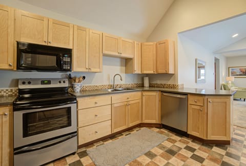 Fully stocked kitchen with everything you need to cook meals at home.