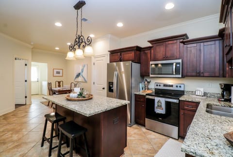 Spacious kitchen open to dining area.