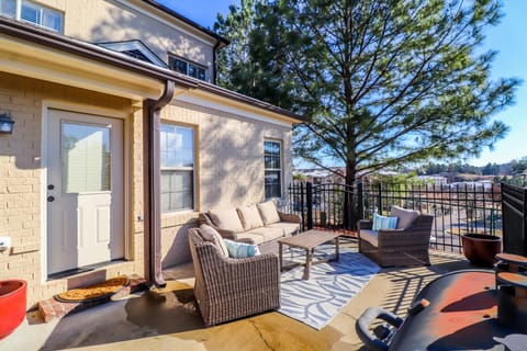 Back Patio features comfortable conversation set furniture.