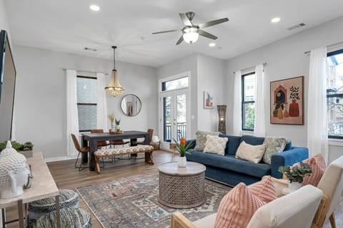 Spacious living room with Queen pullout couch, dining table with seating for 6, HD TV with YouTube TV for cable and all the apps you could want plus a walkout private patio with seating for 2.