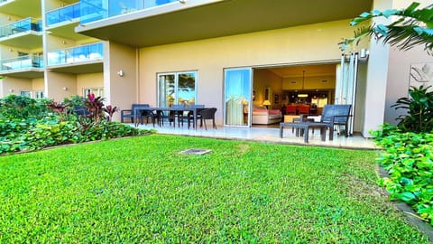 Ground floor, stunning lanai surrounded by gardens for privacy and a play area.