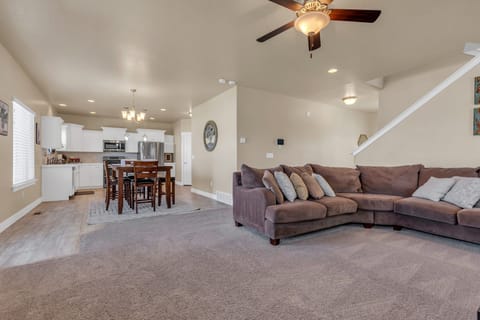 Living room shot with a view of the dining room/kitchen area.