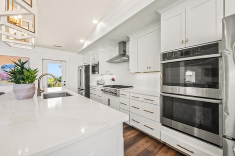 Kitchen with Bar Seating and Ocean Views on Third Level