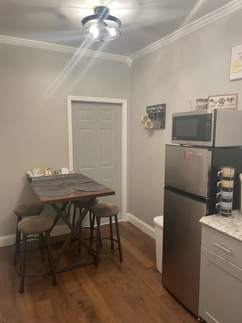 Eating table ( door beyond is owner storage area) 