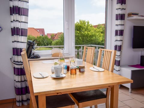 Table, Furniture, Property, Tableware, Sky, Window, Wood, Interior Design, Yellow, Building