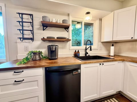 Beautiful kitchen overlooking backyard. Extra special kitchen features!