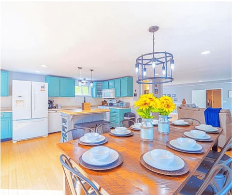 Open concept kitchen, dining room and living room. Read our numerous reviews on our fully stocked kitchen being the best our guests have ever rented