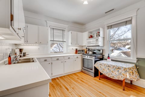 The kitchen has a small breakfast table as additional serving space or a meal with just a few friends