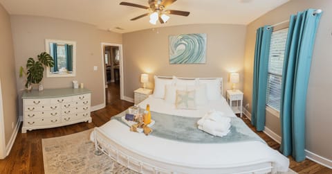 Folly King Bedroom with new bed frame and Zinus foam mattress. Backyard view