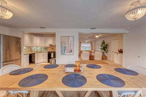 The dining room seats 10 right off the pool and porch.