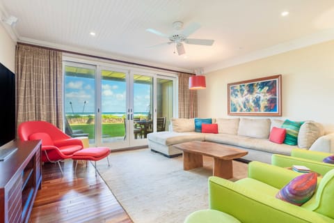 Stunning ocean views from the living room, just steps from the pool and tropical gardens.