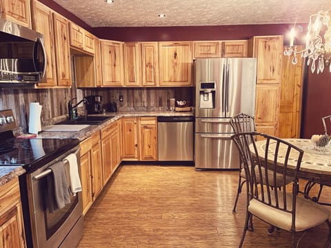 Fully stocked kitchen with additional seating 