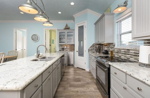 View of kitchen with huge walk-in pantry