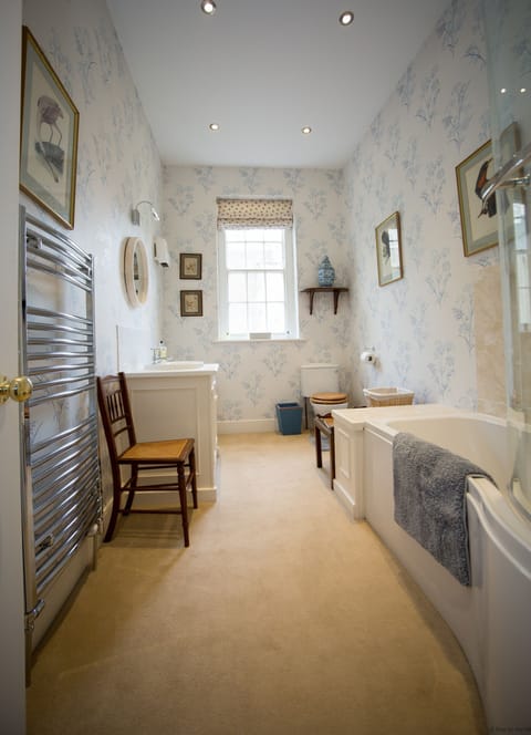 Private bathroom with overhead shower