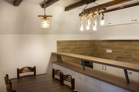 Bar table would be a great spot for you if you want to enjoy glass of vine