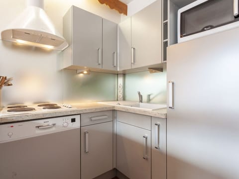 Cabinetry, Property, Building, Countertop, Wood, Kitchen Stove, Exhaust Hood, Interior Design, Kitchen Appliance, Kitchen