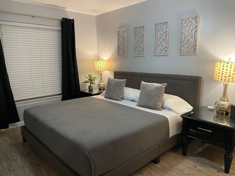 Comfortable, new king sized memory foam bed. Bedroom comes with Amazon Fire Smart TV, blackout curtains, walk in closet, full length mirror, USB fast charging plugs, ceiling fan, and extra blankets and pillows.