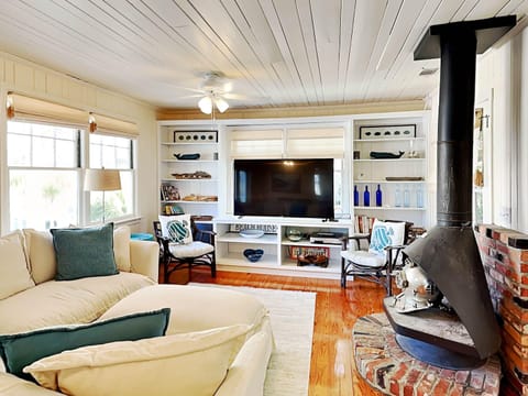 On Cloud Nine Cozy living area with large Smart TV