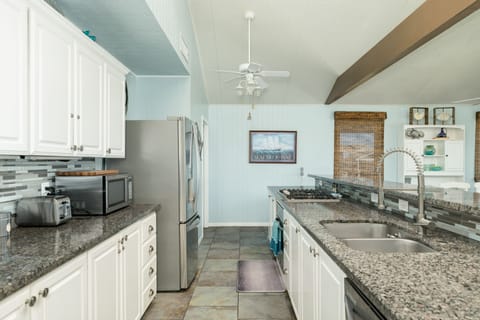 Fully equipped kitchen with stainless steel appliances