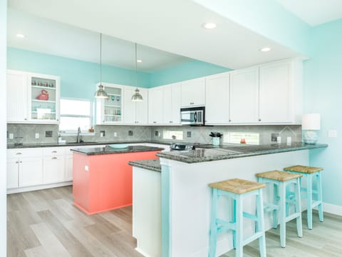 Grab a snack or enjoy meals at the breakfast bar