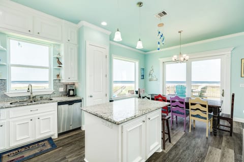 Easily serve meals from the adjacent kitchen island