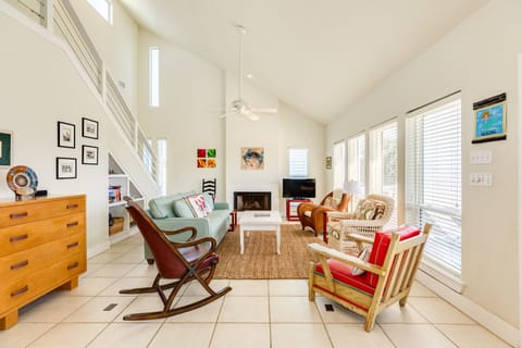 Large open living area with wall of windows