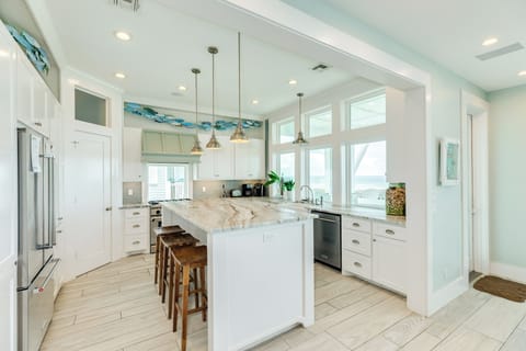 Kitchen island is perfect for serving or casual dining