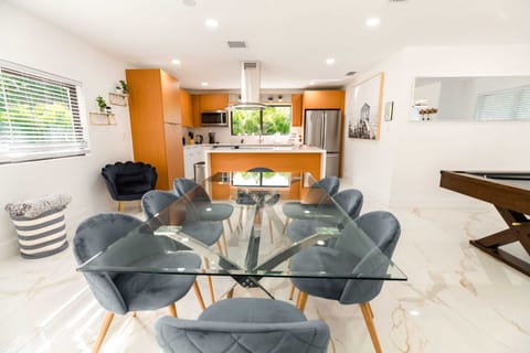 Modern dining room with 8 chairs.