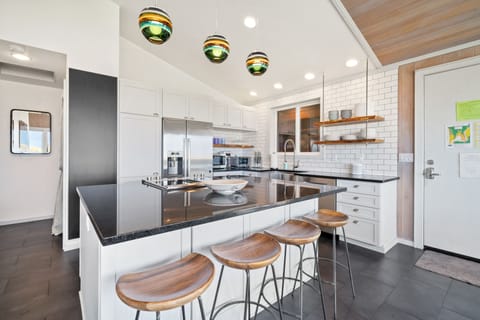 Gather around the island to join in the cooking fun.