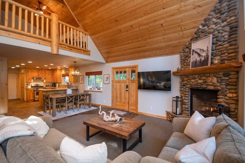 Relax by the fire and watch your favorite movie on the new 60inch Smart TV.