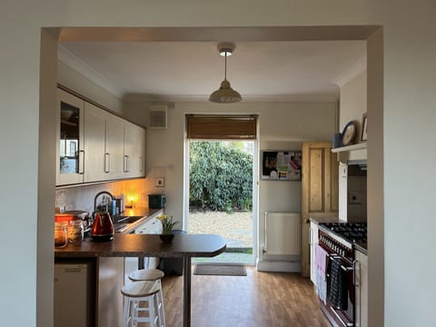 Kitchen with french windows to garden